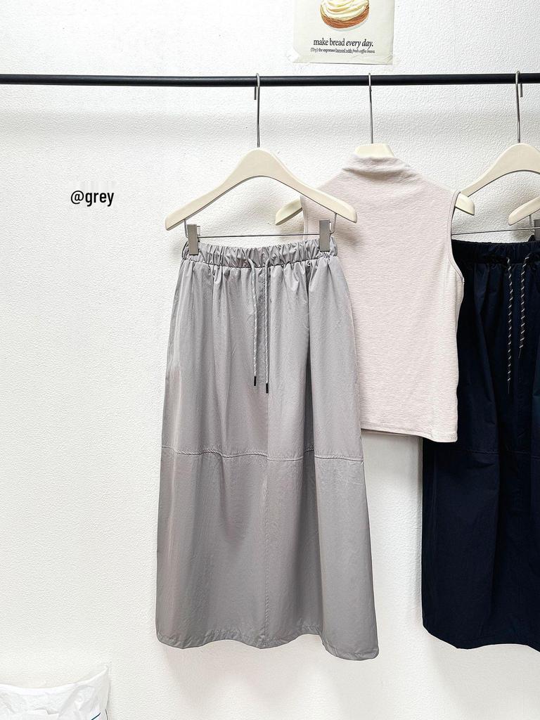 2026 Spring/Summer Retro Cocoon Mid-Length Elastic Waist Skirt - Stylish Solid Color Artistic Bud Design