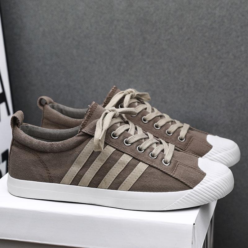 New Mens Canvas Shoes Lightweight Breathable Versatile Casual Shoes Mens Low Top Flat Sports Shoes Man Designer Sneakers Men