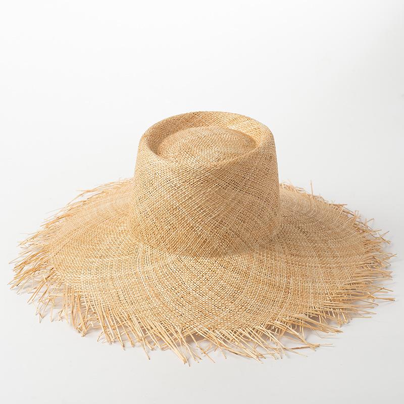 Summer new sun hat European and American simple treasure grass big burr edge beach hat spring and summer sun protection big eaves flat top straw hat