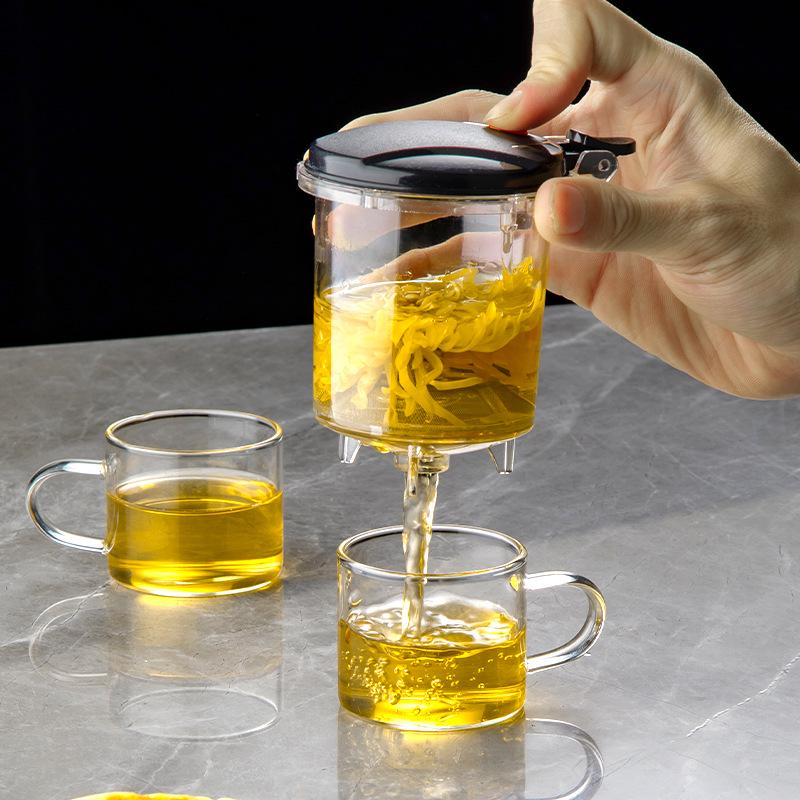 Elegant Heat-Resistant Glass Tea Infuser Pot with One-Button Filtering - Customizable with Logo Option.