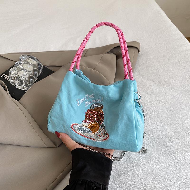 

2025 summer new Japanese nylon embroidered bag fashionable and simple niche commuter foreign style messenger bag shoulder bag синий