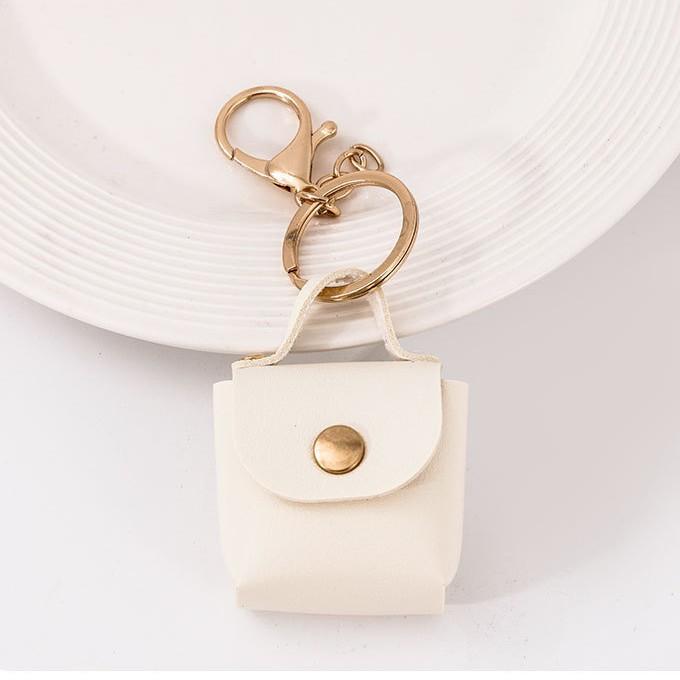 

Amazon сумка для зміни міні маленька сумка для зберігання ПУ шкіра однотонна квадратна сумка брелок аксесуари автомобільний кулон бежевий