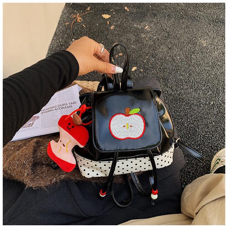 2025 Autumn Cute Apple Pendant Women's Lightweight Travel Backpack - Large Capacity, Casual Commuting Bag