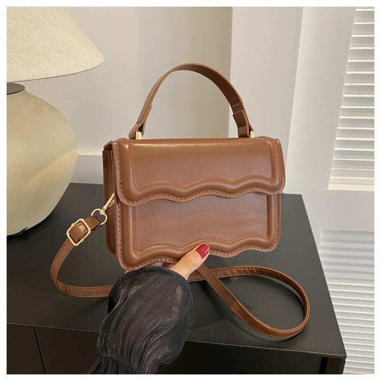 

Small fresh and simple small square bag 2024 autumn new women s bag fashion shoulder bag solid color handbag oblique span bag темно-коричневого кольору