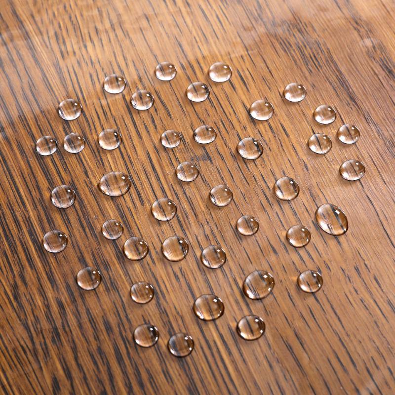 Față de masă transparentă din PVC, rezistentă la apă, la ulei și la praf.