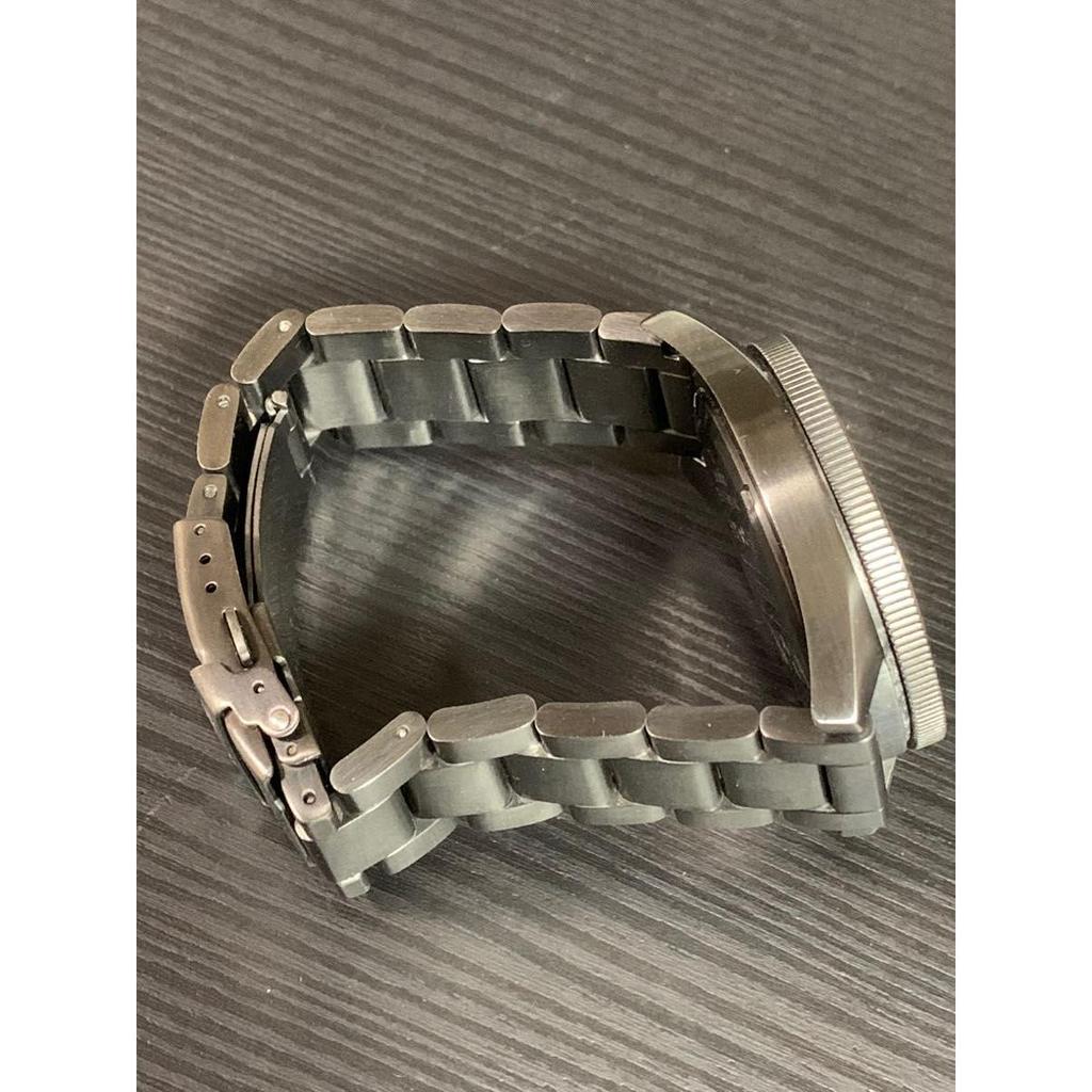 Used NIXON analog watch metallic black