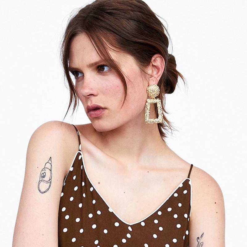 Vintage Damenohrringe vergoldet mit geometrischen Formen