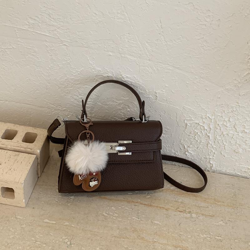 Elegant Commuting Bag for Work with A Chic Kelly Bag Style, Single-shoulder Cross-body Design.