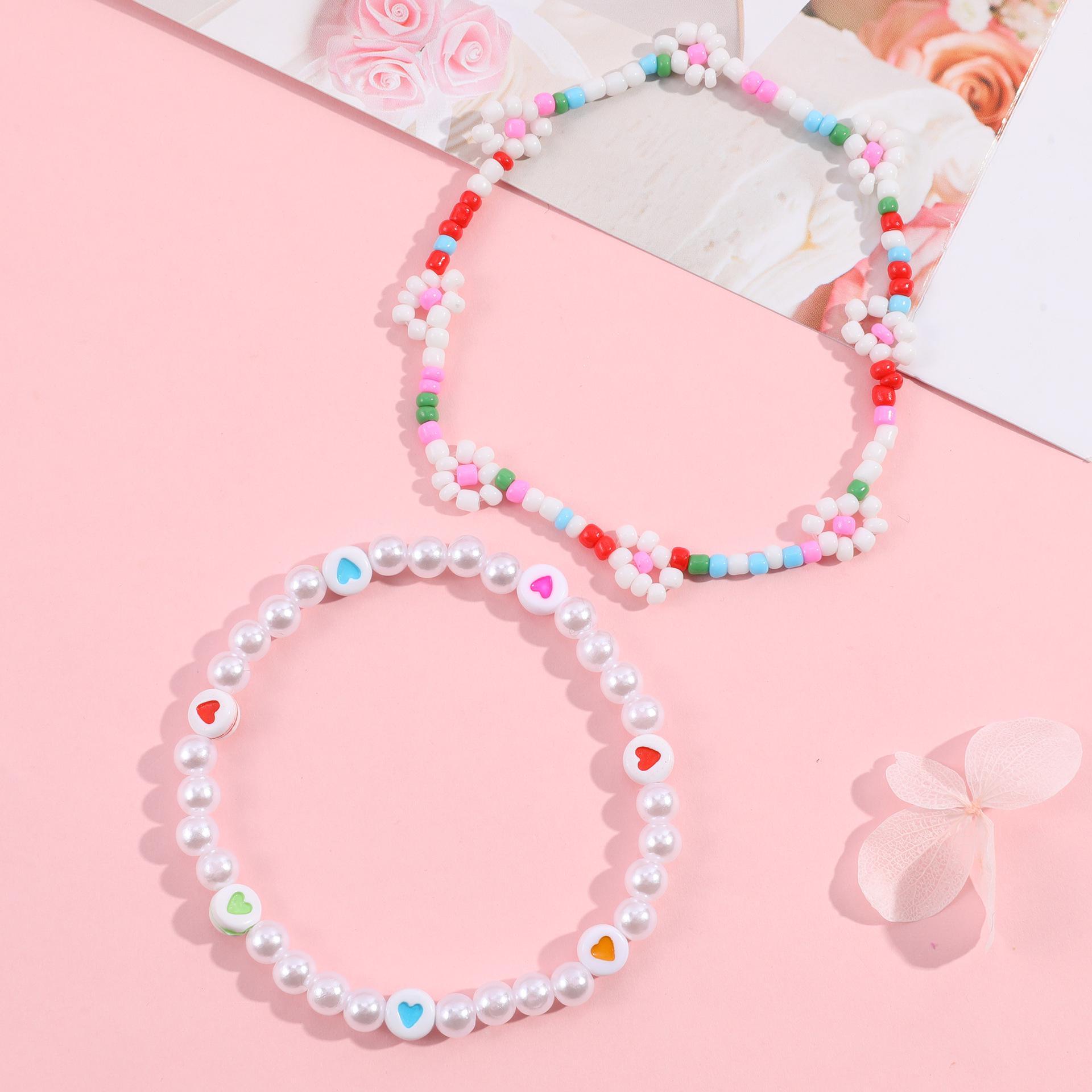 

Kids Two-Piece Bracelet Set: Xiaomi Beads & Daisy Flower Rice Bead Design