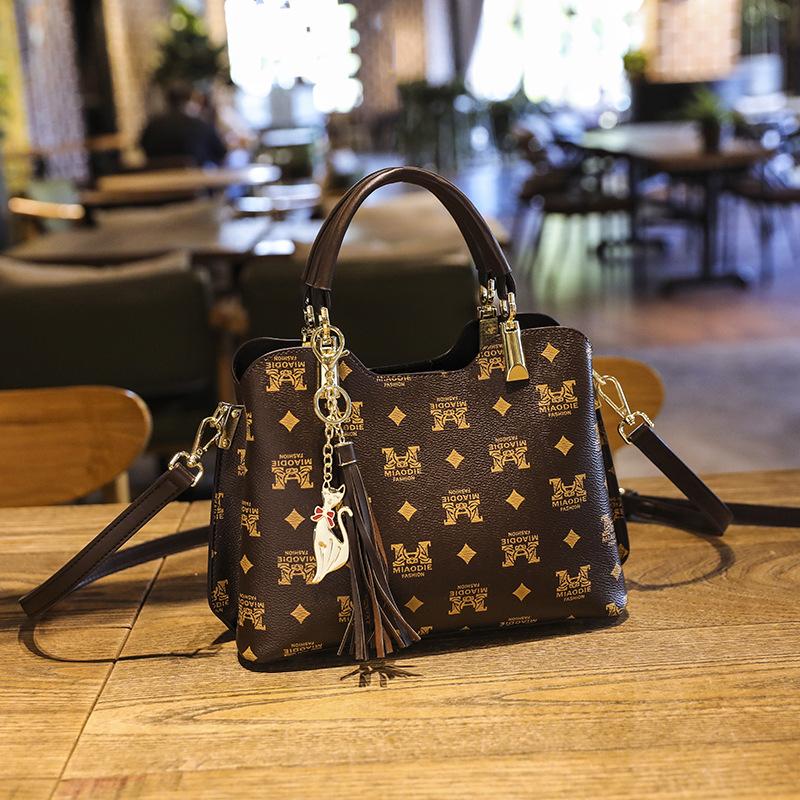 

New women s bag fashionable versatile letter bucket bag retro printed handbag high-end shoulder messenger bag