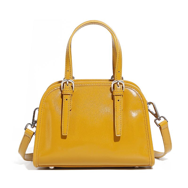 

Сумка-тоут женская новая из коровьей кожи сумка-йо-йо сумка для боулинга женская ретро для работы большая вместимость на плечо 21*9*16 жёлтый