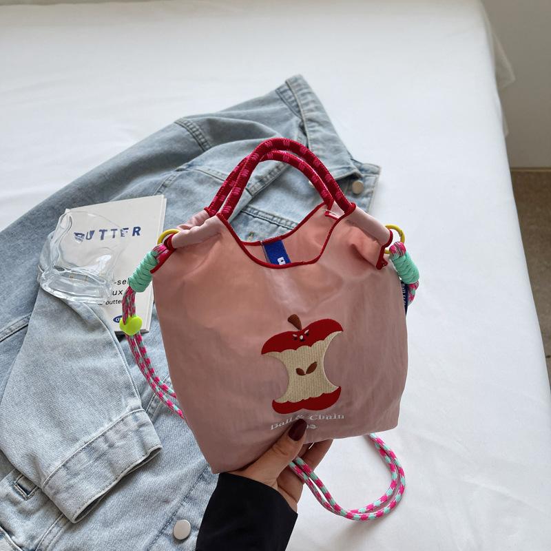 Japanese embroidery cute apple bucket bag girl 2025 new mobile phone bag versatile commuter shoulder messenger bag