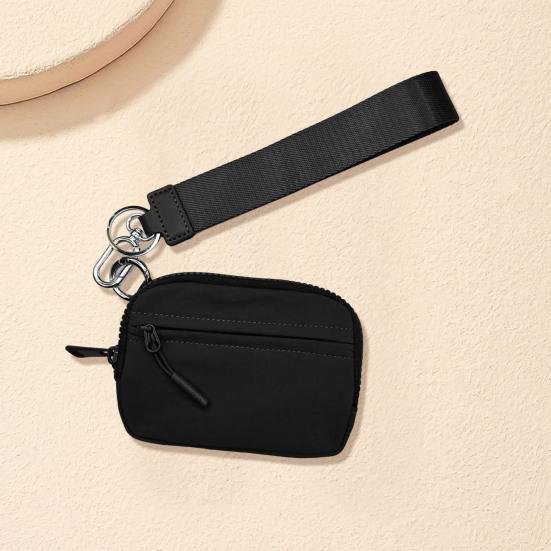 Minimyntveske med håndleddsstropp og rom for flere kortspor Glidelåslukking Bærbar