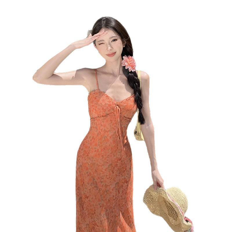 The Real Shot of the New Floral Vacation Dress Closes the Waist and Shows White and Orange Suspender Skirt.