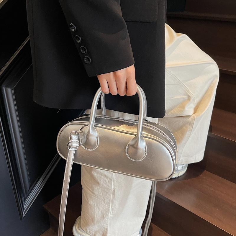 New niche high-end sense simple solid color personality versatile fashion portable messenger women's bag
