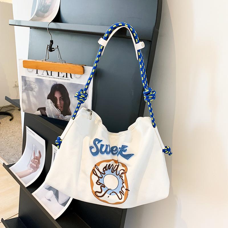 Bag 2025 summer new casual Korean version donut printed canvas bag bag large capacity student schoolbag shoulder bag