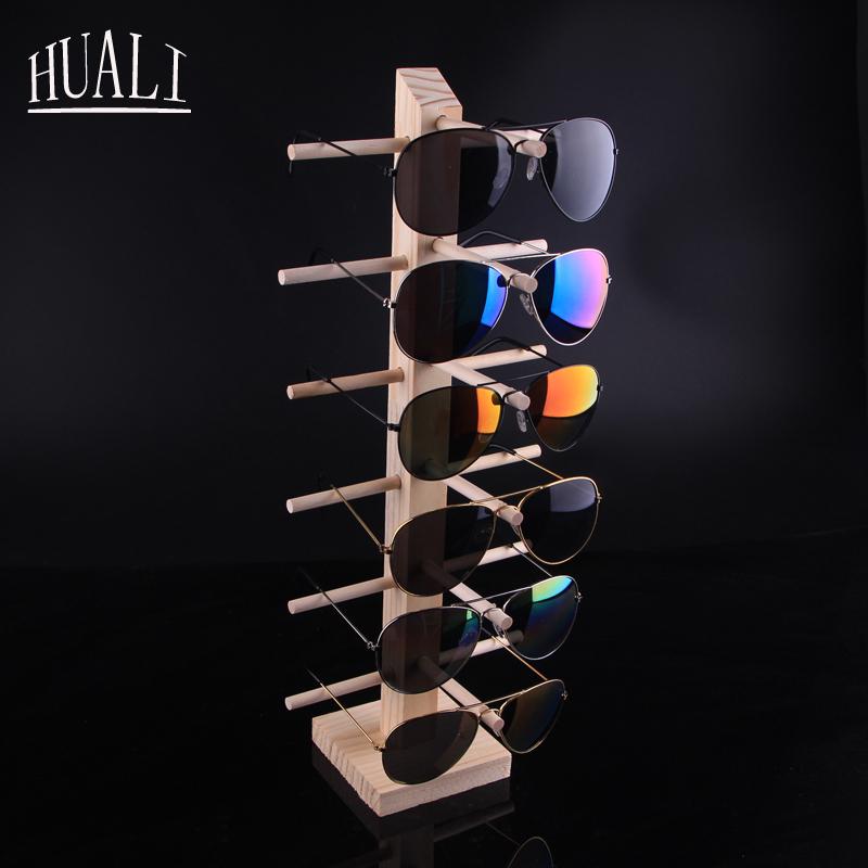 Stojak podłogowy z litego drewna na oprawki okularów i okulary przeciwsłoneczne