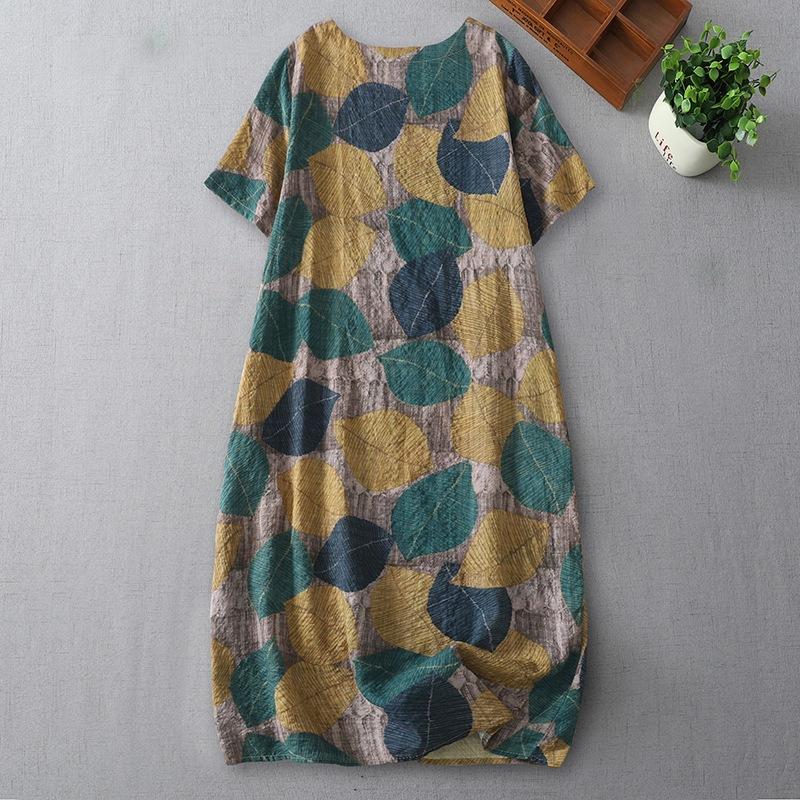 summer new loose printing medium and long dress that covers the belly and shows thinness