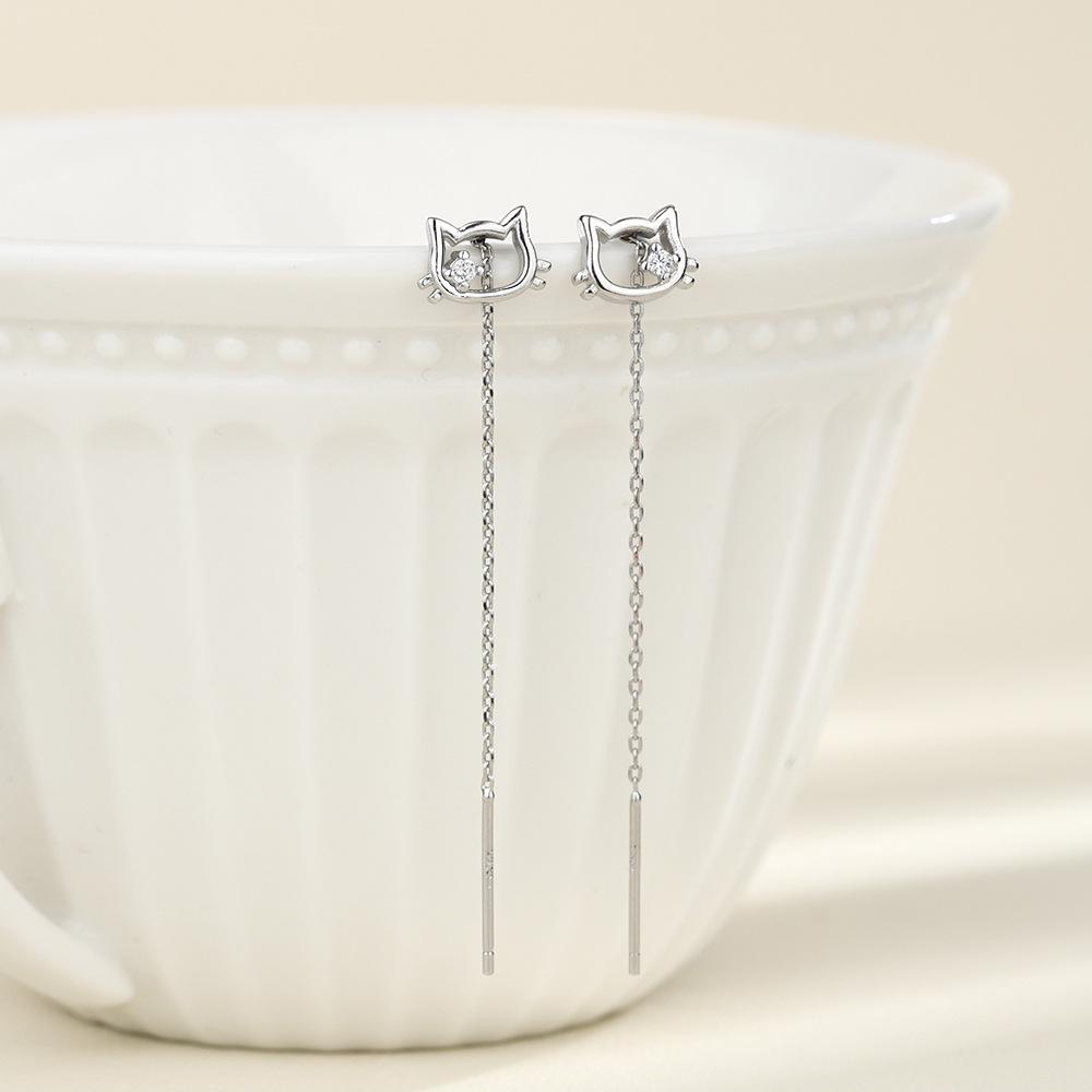 Trendy Cat Ear Tassel Earrings with Single Diamond and Hollow-out Design