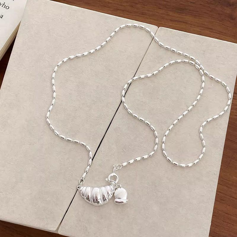 

Тяжелая промышленность Простая девушка Сердце Рисовое зерно Оливковое ожерелье из бисера Круассан Круассан Ключица Ключичная цепочка Женщины