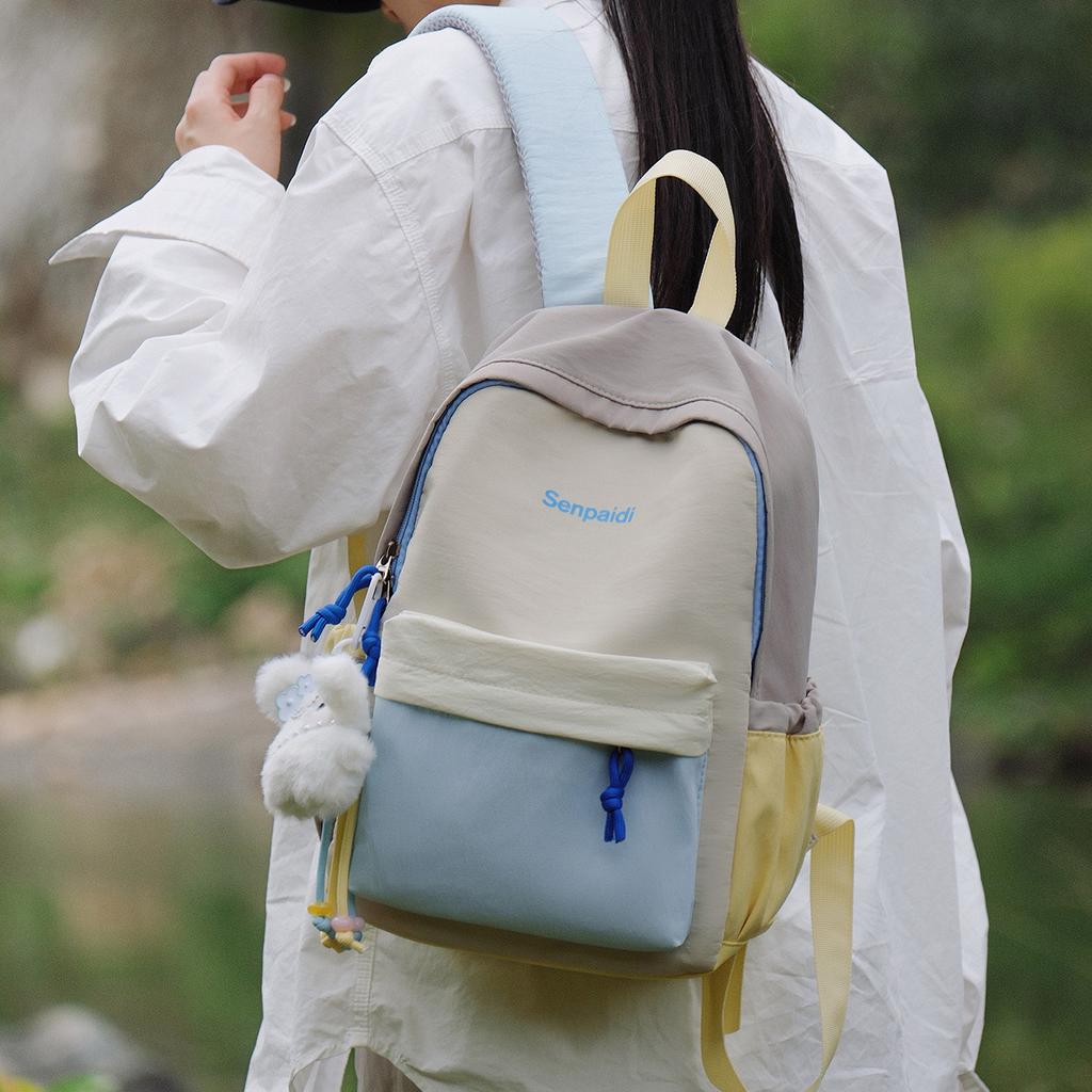 Schoolbag1011 new contrasting color splicing backpack, male and female students small schoolbag, outdoor travel high value leisure backpack