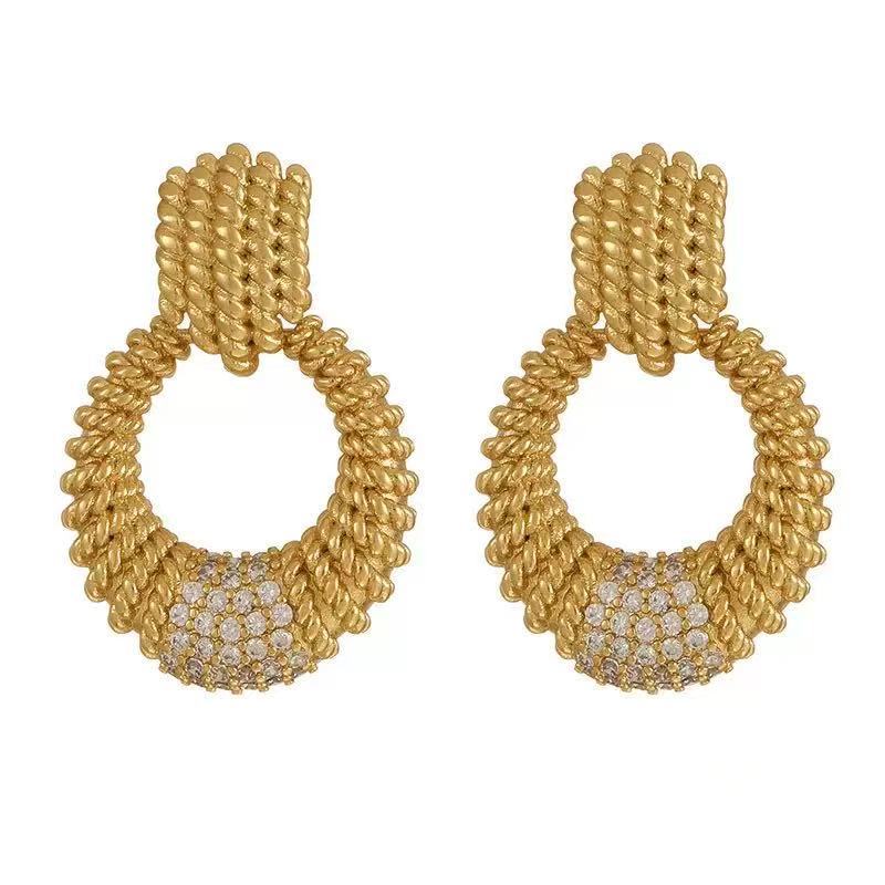 European and American French new round high-end diamond-encrusted earrings, niche exaggerated geometric twist texture light luxury earrings