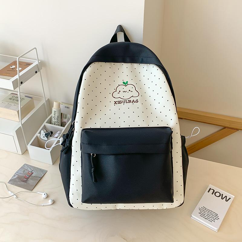 Schoolbag schoolbag junior high school girl cute girl heart polka dot backpack large capacity college student 1011 new backpack