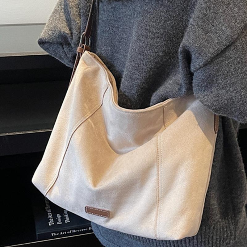 Lässige Wildleder-Tasche mit großem Fassungsvermögen für Damen, neue Retro-Umhängetasche für Pendler, hochwertiger Shopper für Damen