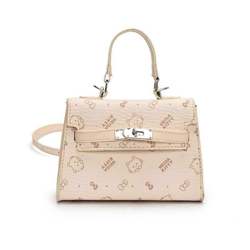 This year, the Korean version of the popular temperament cute printed portable Kelly bag niche light luxury versatile foreign style messenger wom