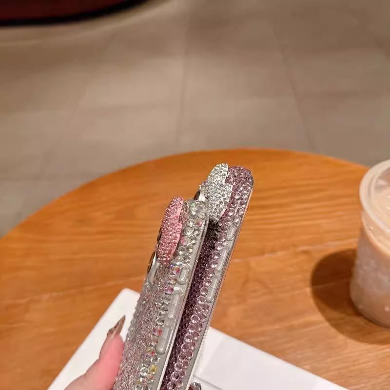 Cea mai recentă husă de telefon cu funde strălucitoare roz și argintii și este compatibilă cu iPhone 16, 15, 14, 13, 11, 12 Pro Max și 16 Plus