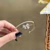 Elegant Zircon Geometric Open Bangle: A Luxurious, Versatile Bracelet for Women.
