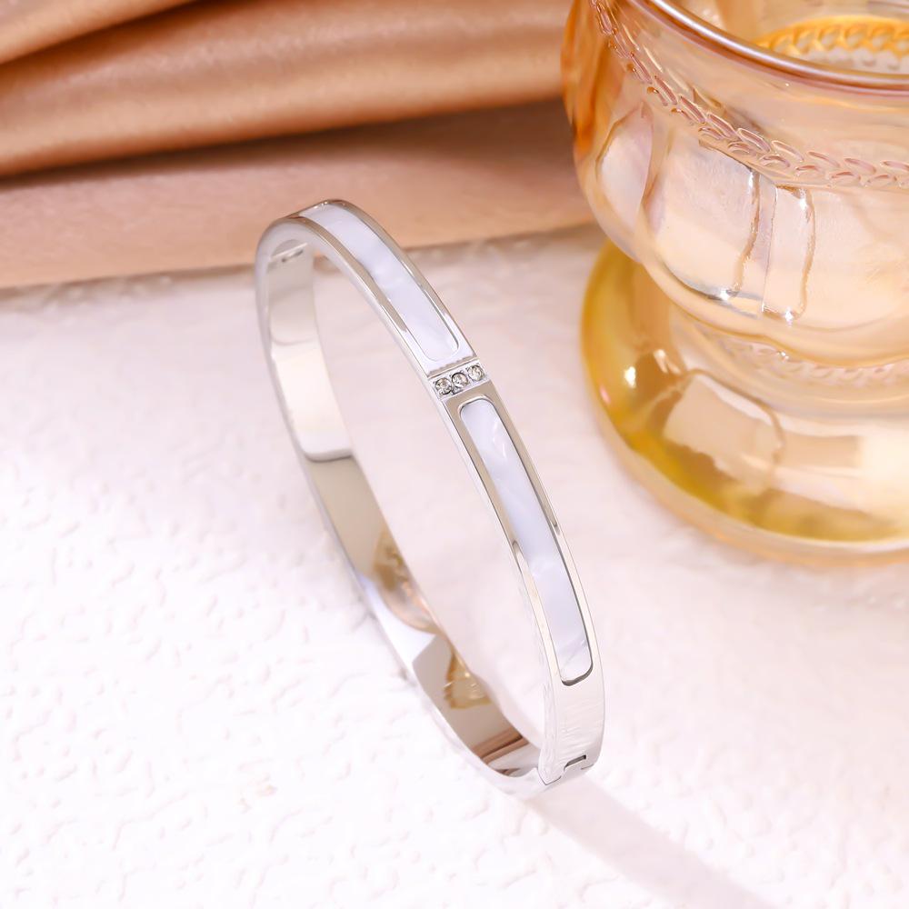 

Stainless Steel White Mother-of-Pearl Three-Diamond Bangle, European & American Style, 18K Vacuum Plated.