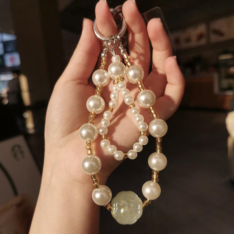 Mobile phone lanyard handmade beaded size pearl wrist chain pendant pendant women's short high-end pendant anti-loss