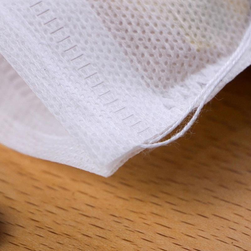 מסנני תה רב פעמיים עם שרוך ריקים (חבילה של 100) לתה בתפזורת וקפה