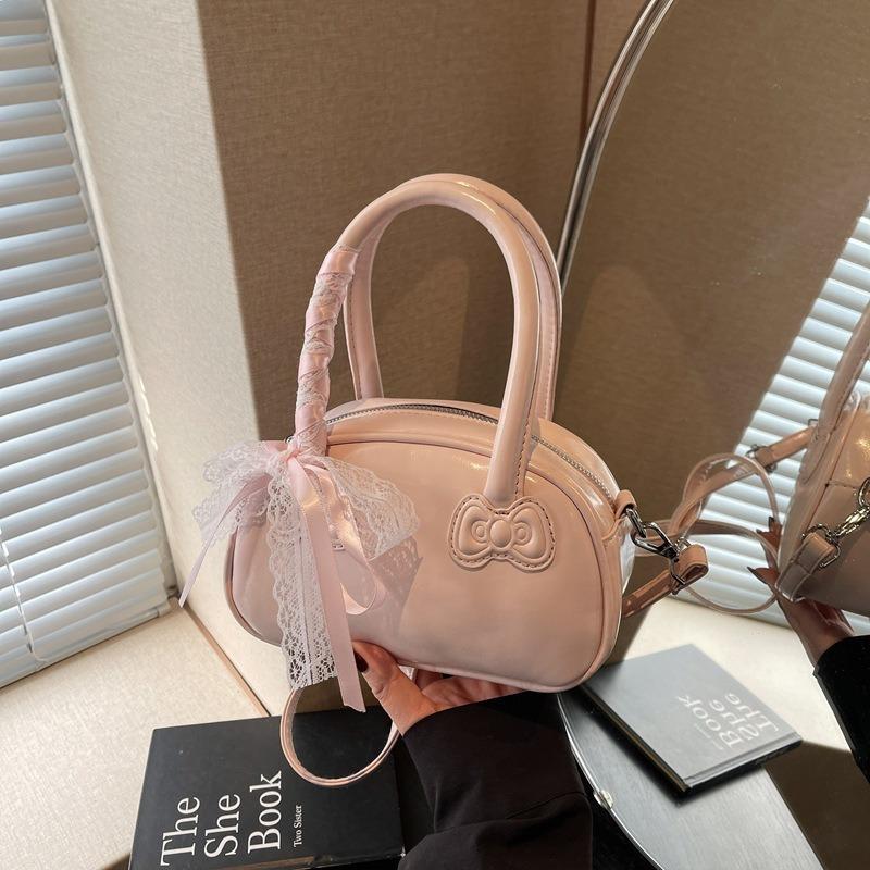 Spring and summer hand carry bow pillow bag women's new simple and fashionable shoulder bag high-end messenger bag