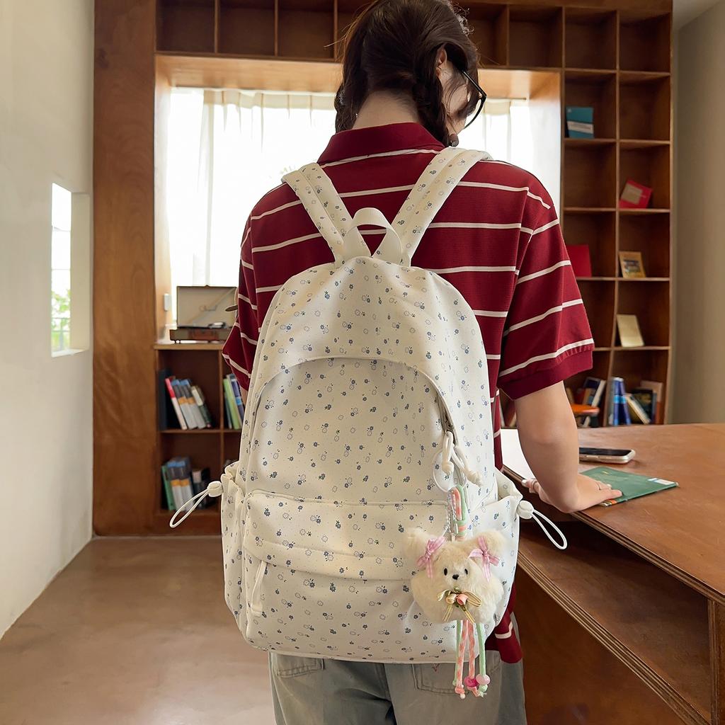 Schulrucksack große Kapazität Schulrucksack Mittelschule Oberschule Schüler Freizeit neue Version Koreanischer kleiner floraler Rucksack Studenten Reise