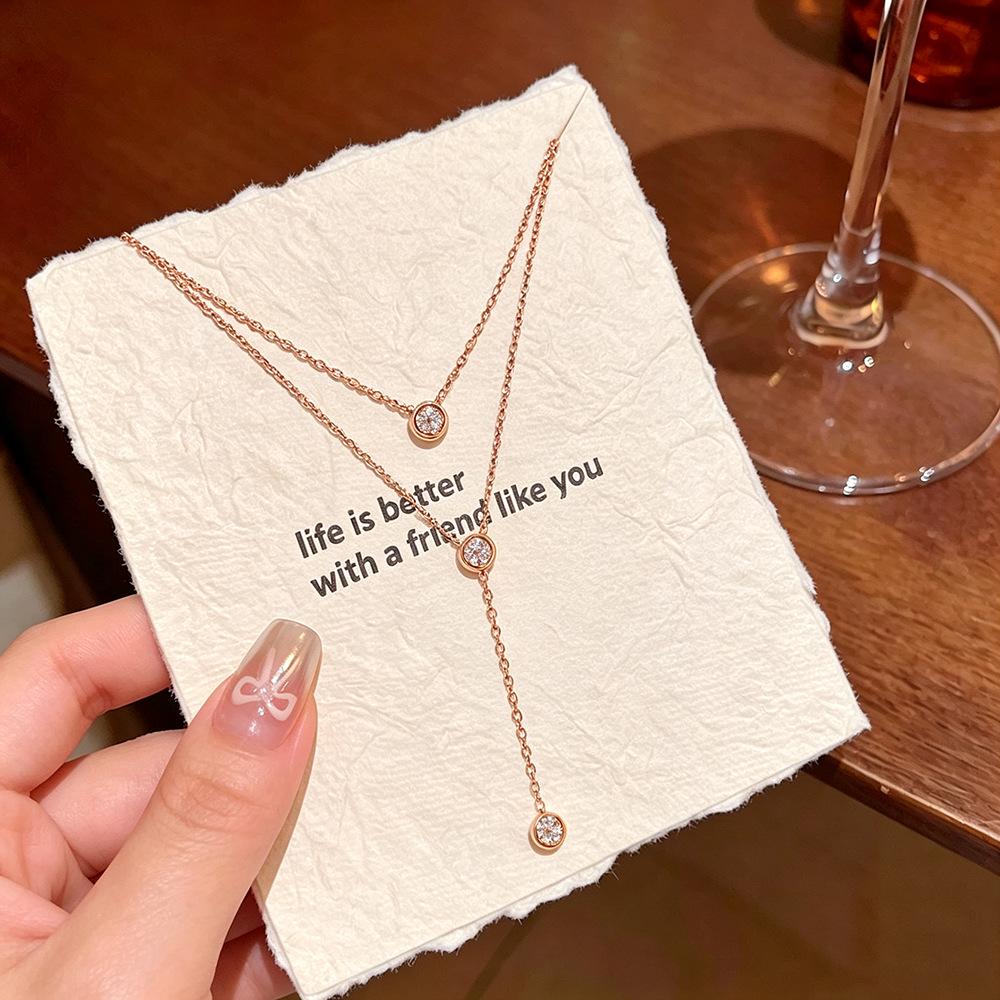 Elegant Minimalist Double-Layer Diamond Tassel Necklace – High-End Titanium Steel Clavicle Chain for Women