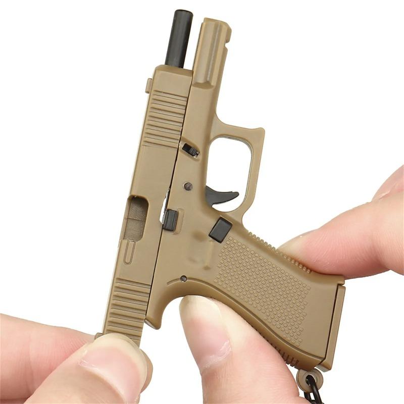 Pistolenförmiger Schlüsselanhänger-Anhänger Realistisches Modell Abnehmbares Magazin Miniatur-Pistolenmodell Geschenke zum Geburtstag Autoschlüsselanhänger für Männer