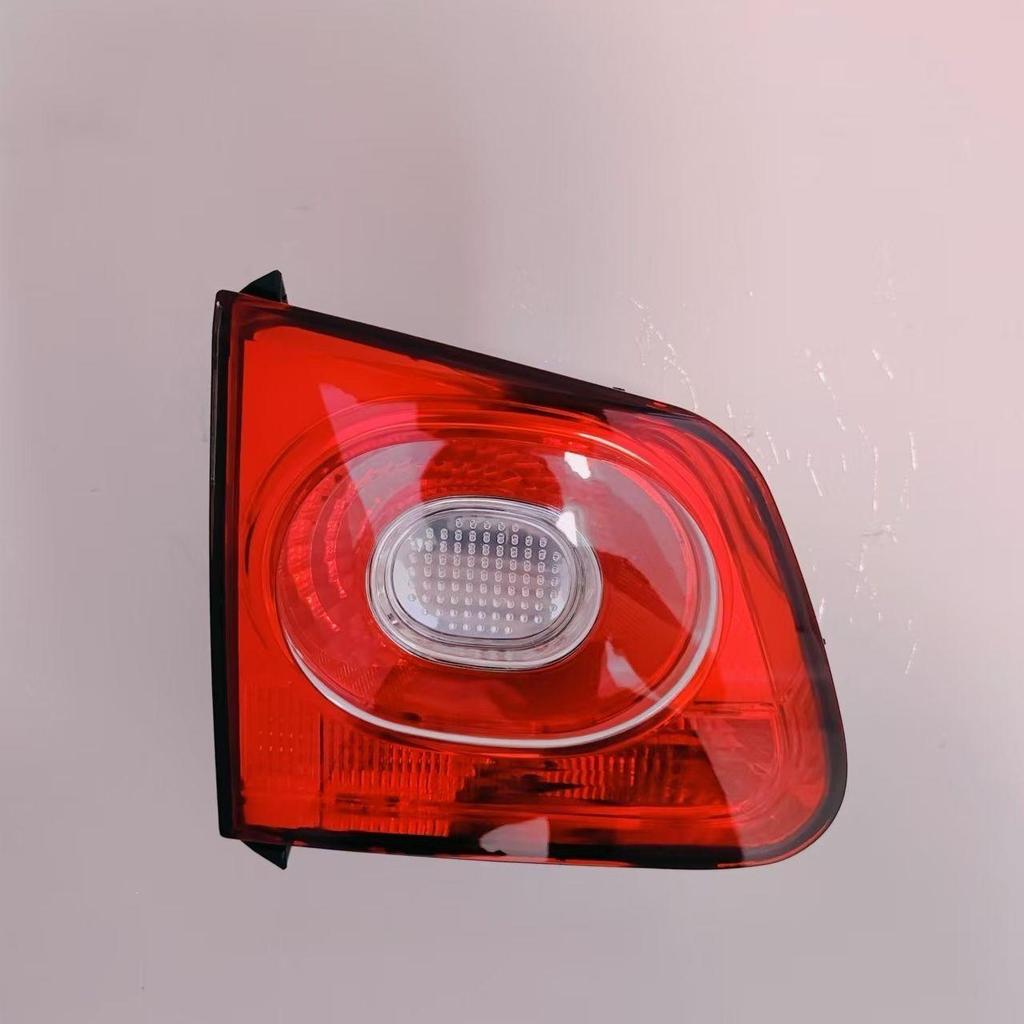 Fits Volkswagen Tiguan 2010-2016 Rear Tail Light Assembly Housing with Brake, Turn, and Reverse Lights.