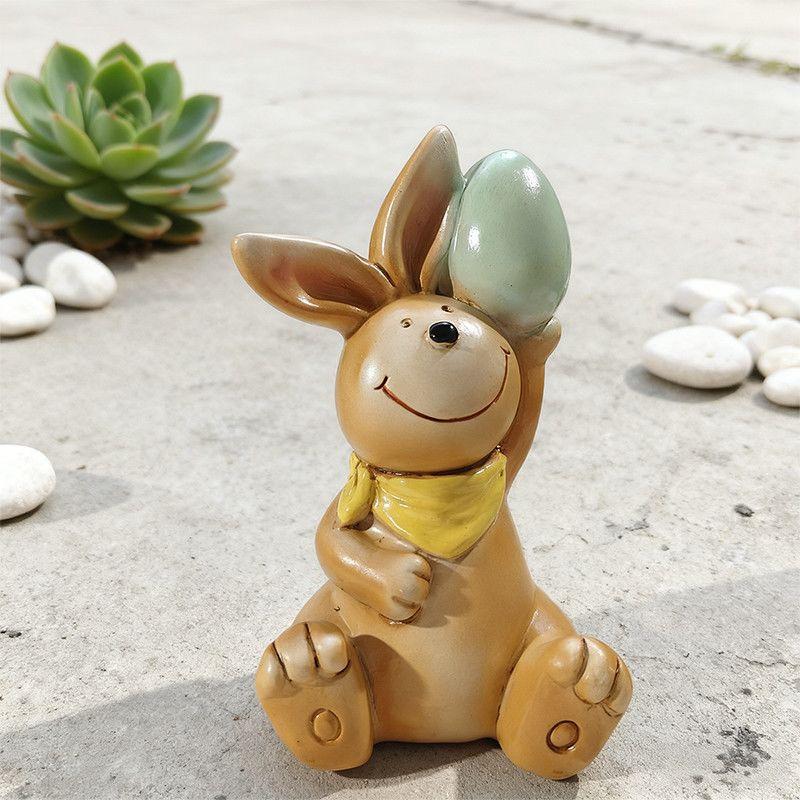 The retro brown rabbit statue decoration ornament with eggs is suitable for Easter home garden desktop decoration.