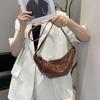 A High-end and Niche New Moon Commuter Bag Made of Cowhide Dumplings and Horns
