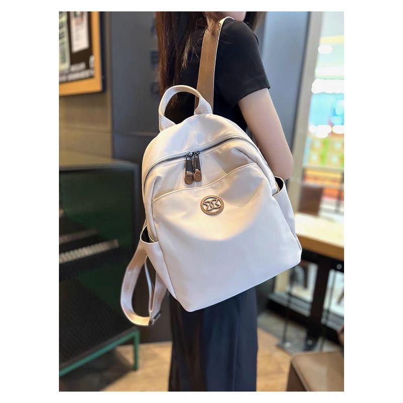 

Oxford Cloth Backpack for Women 2025 New Arrival Niche Design Leisure Travel Backpack Waterproof Lightweight and Large Capacity Apricot White