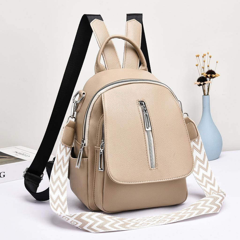 Backpack women's trendy women's bag texture solid color travel bag PU material