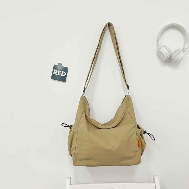

Large capacity simple tooling wind messenger bag women s solid color lightweight tote bag summer sports shoulder bag хаки