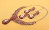 Touchstone Indian Bollywood Traditionally Marked White and Red Rhinestone Alluring Bridal Designer Jewelry Necklace Set In Silver Tones for Women.