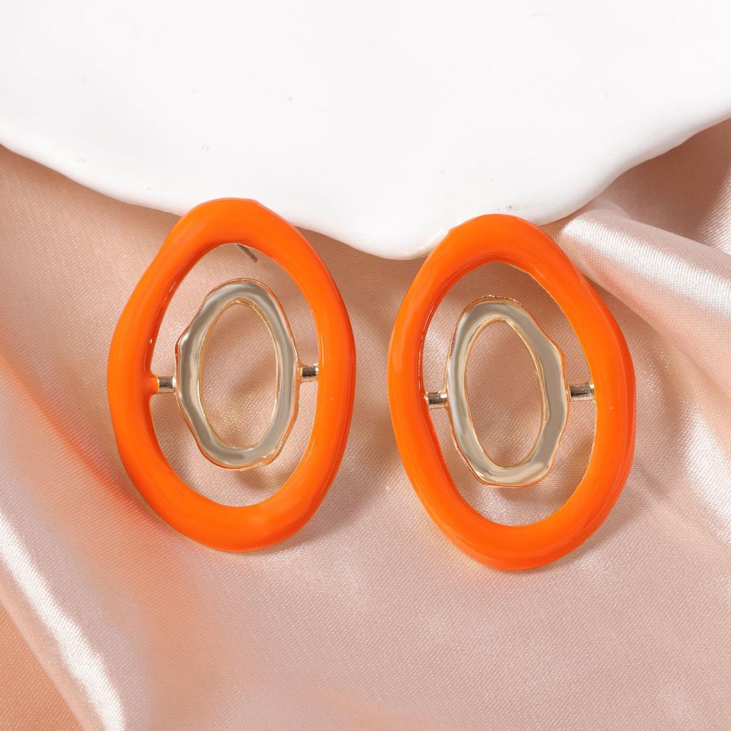 Korean version of dopamine color hollow geometric creative design sense round alloy stud earrings daily commuting