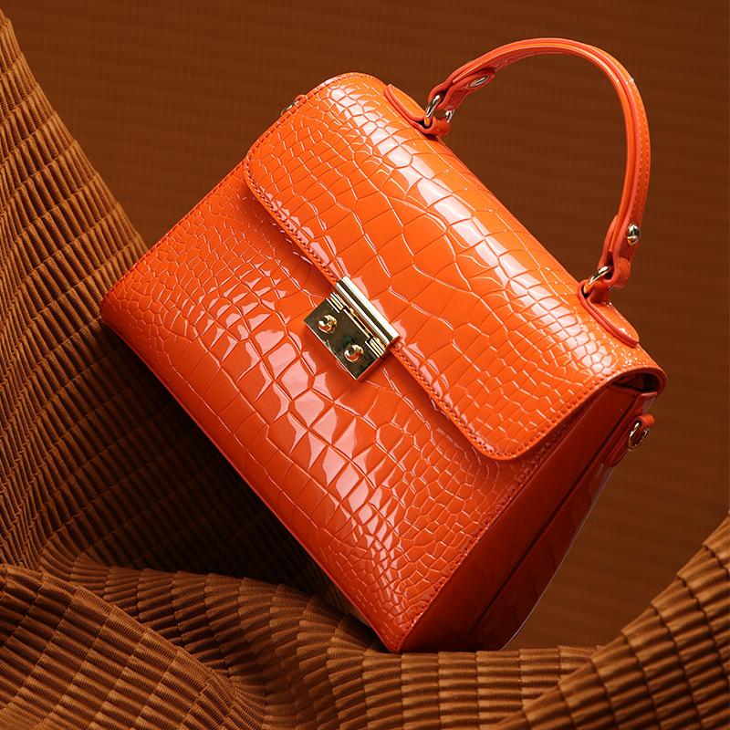 

New designer women s bag handbag niche leather handbag large capacity platinum bag S помаранчевий