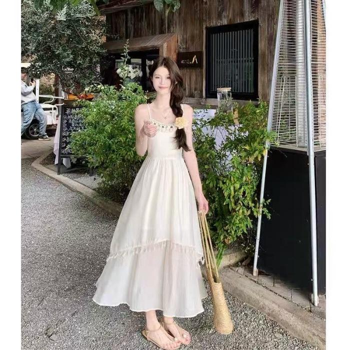 Holiday Wind Fringe Splicing Suspender Dress Women's Summer 2026 New Waist Irregular Gentle First Love Long Dress