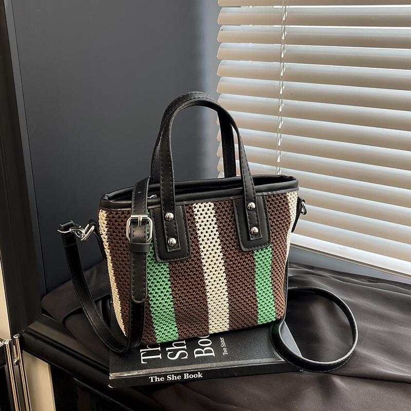 

Summer fashion handbag small bag women s 2025 new hollow bucket bag simple striped contrasting messenger bag коричневый