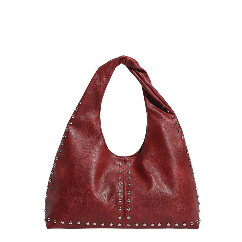 

Studded Leather Hobo Bag Women s Rivet Shoulder Bag with Unique Knot Handle and Edgy Design